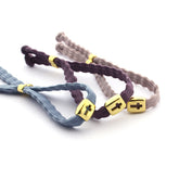 VERONA- pulsera cruz dorada elástica 7mm